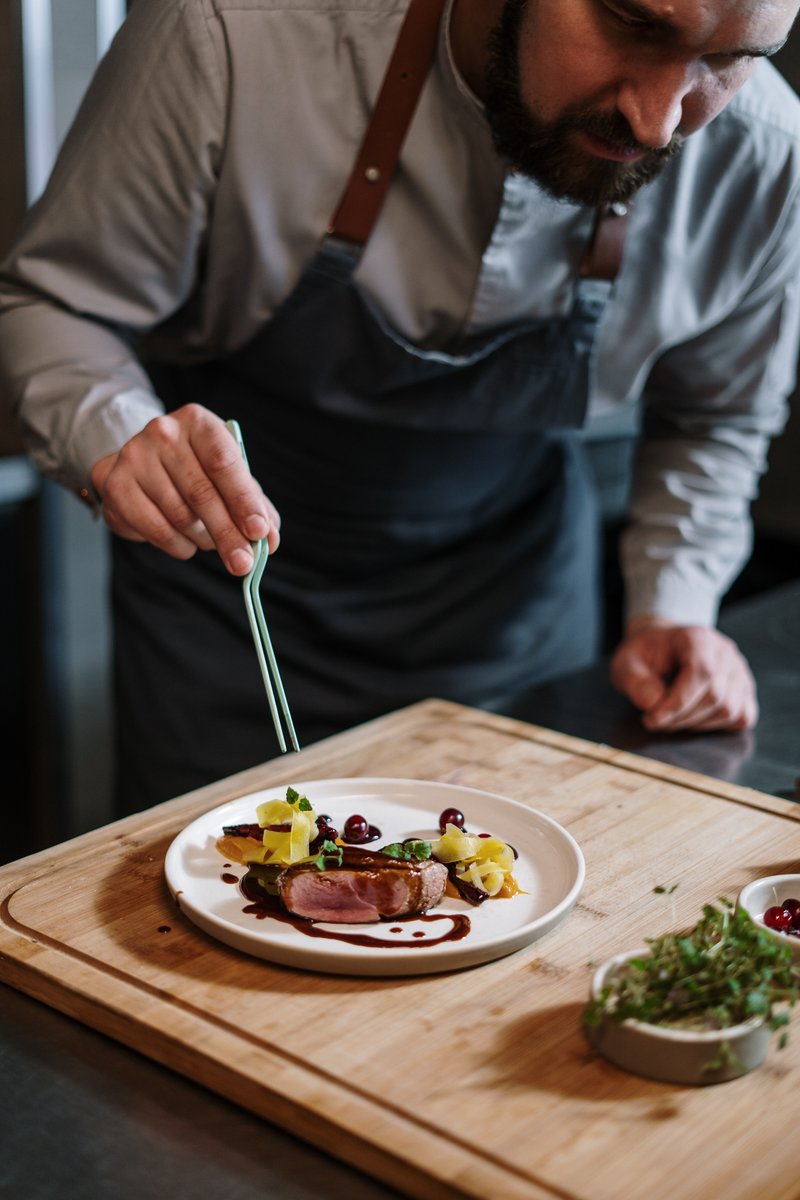 Chef plating food beautifully